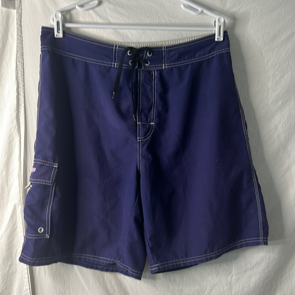 Royal blue body glove, men’s swim trunks, size 36 side pocket